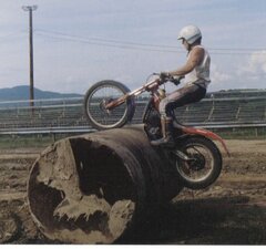 Me test riding the oil barrel for our motorcycle event we put on.
